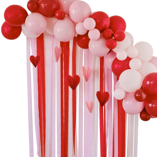 Red & Pink Balloon Garland Party Backdrop with Streamers and Paper Heart Decorations